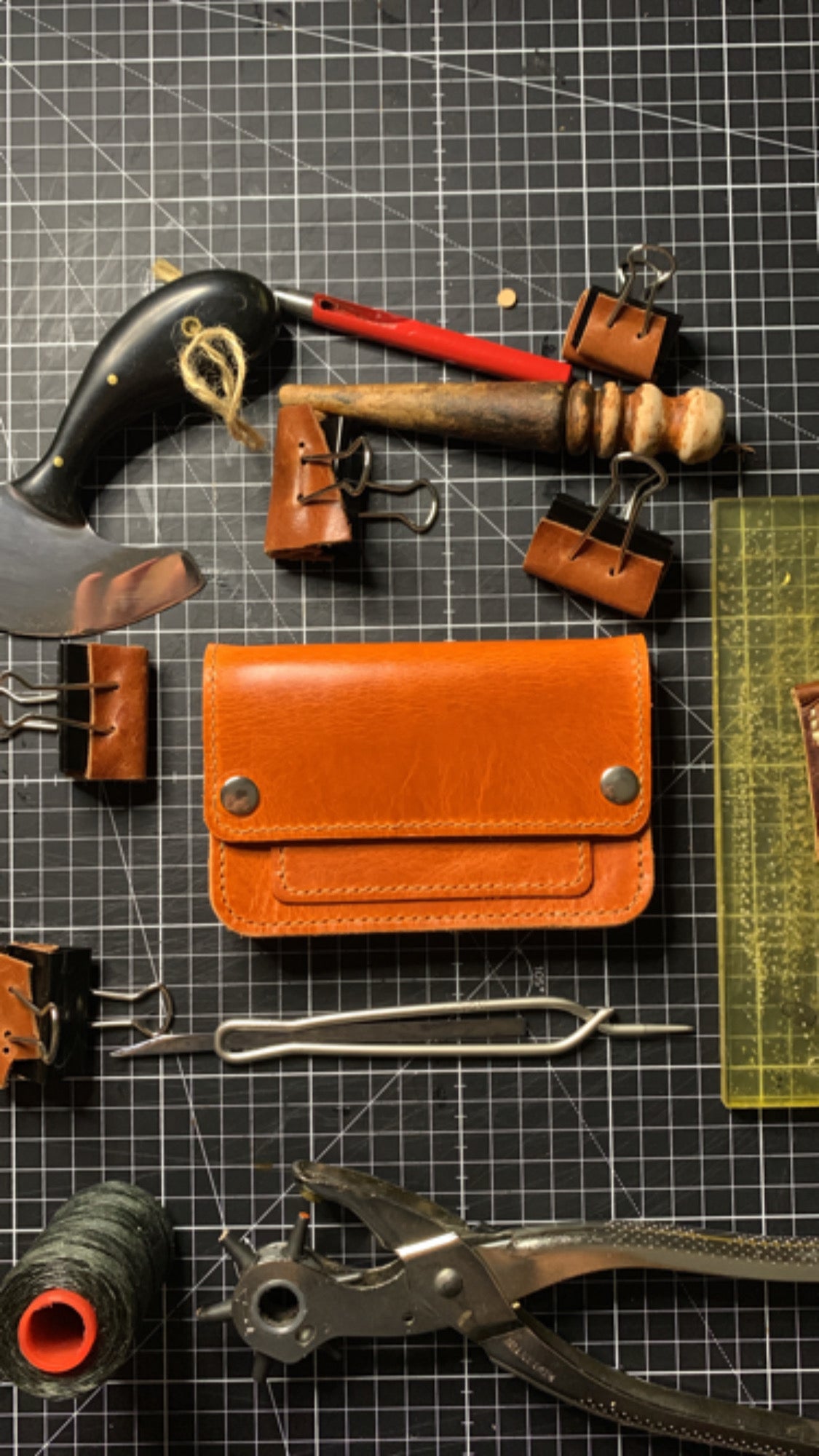 Mid size trucker wallet made using orange Gaucho Leather